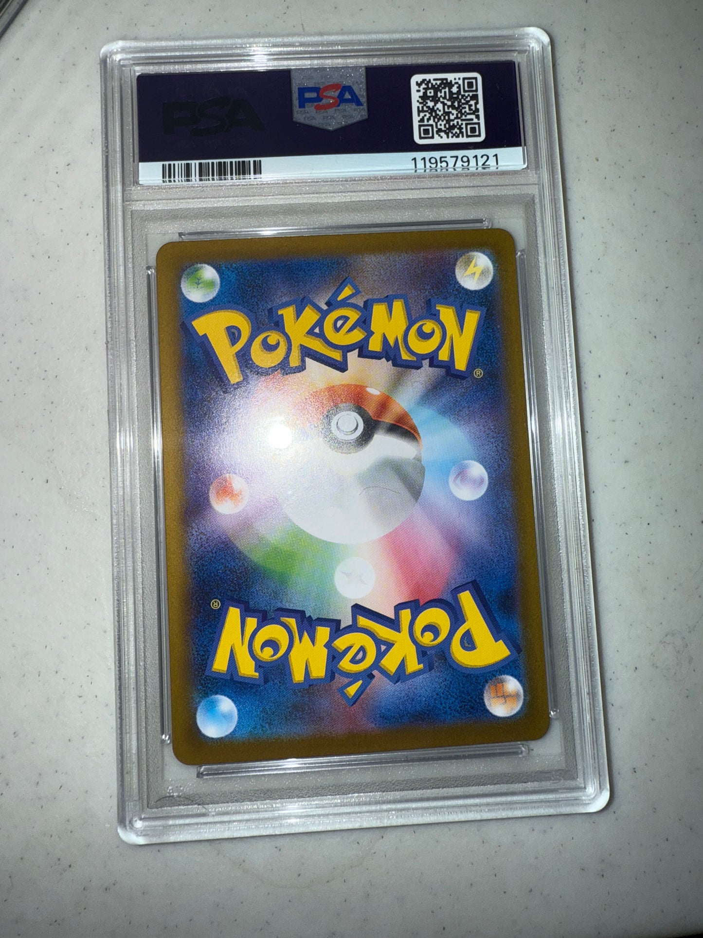 back of irl 2025 POKEMON JAPANESE SV10-GLORY OF TEAM ROCKET #103 ROCKET'S WOBBUFFET ART RARE PSA 10