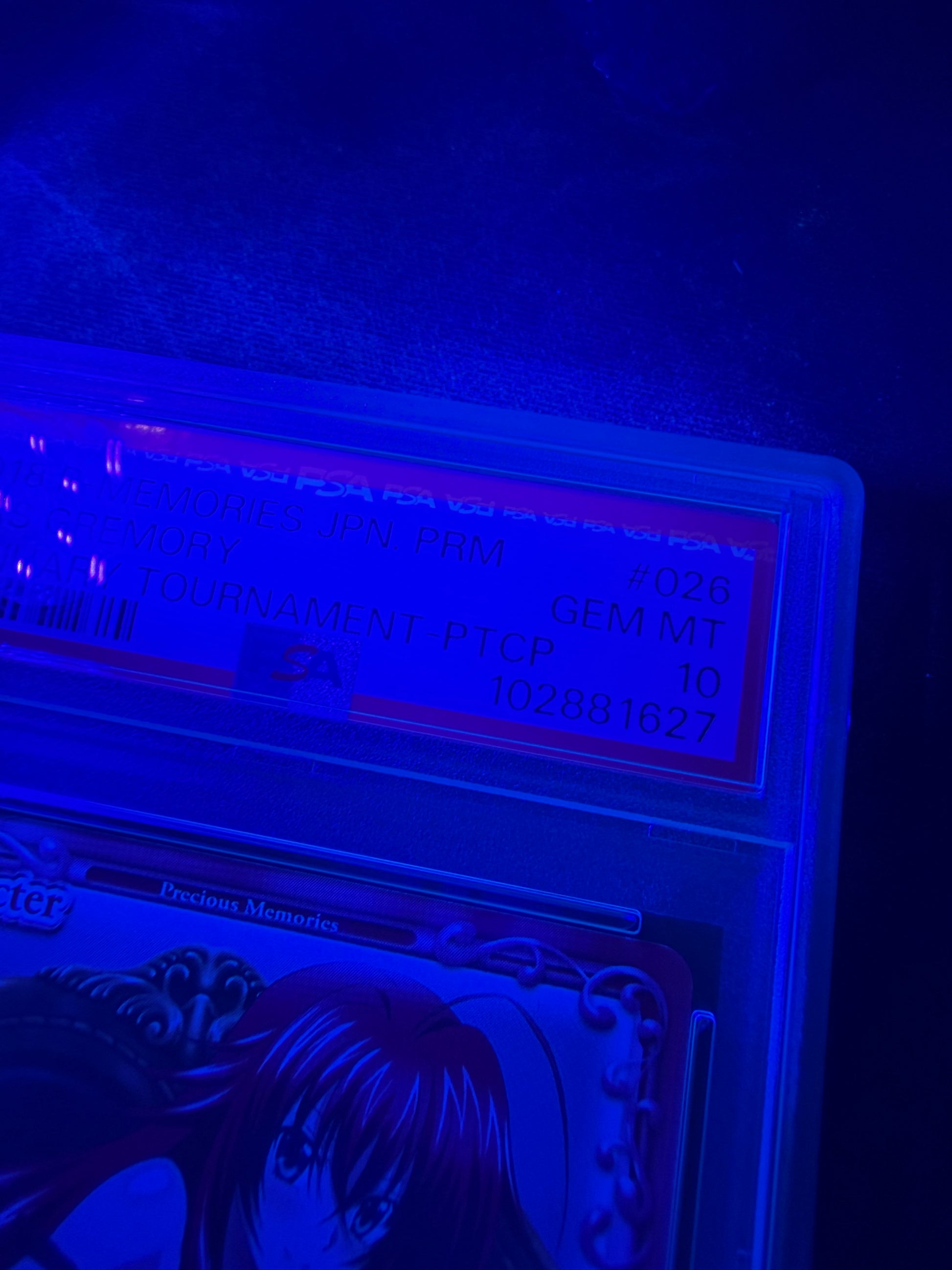 black light photo of 2018 PRECIOUS MEMORIES JAPANESE PROMO #026 RIAS GREMORY JANUARY TOURNAMENT-PTCP PSA 10